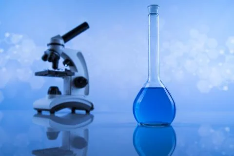 Microscope, Laboratory beakers,Science experiment Stock Photos