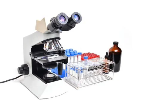 Microscope with laboratory equipment Photos