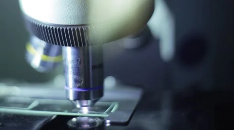 Microscope. Lens and glass for viewing bacteria Stock-Footage 53823061