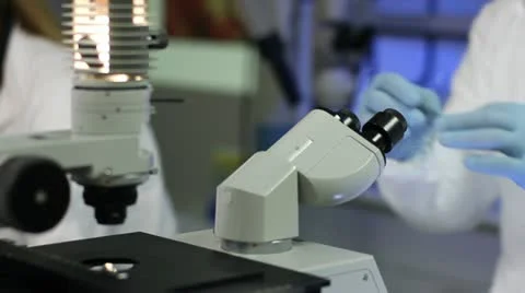 Microscope Man Close Up Stock Footage 22775780