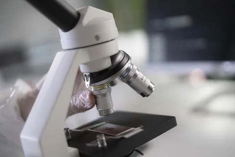 A microscope in a medical research lab. Stock Photos
