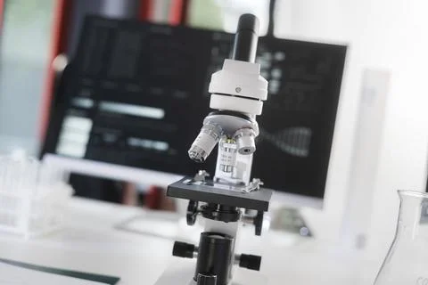 A microscope in a medical research lab. Stock Photos
