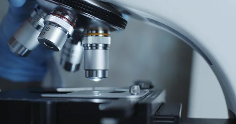Microscope with metal lens at laboratory. Stock Footage 96104239