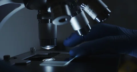 Microscope with metal lens at laboratory. 스톡 동영상 96107287