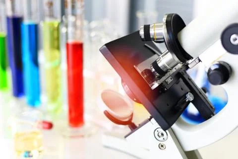 Microscope in modern lab for scientist research science or medical - microsco Stock Photos