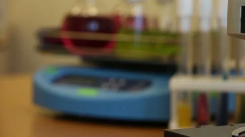Microscope on the moving blurred laboratory background Stock Footage 63614070