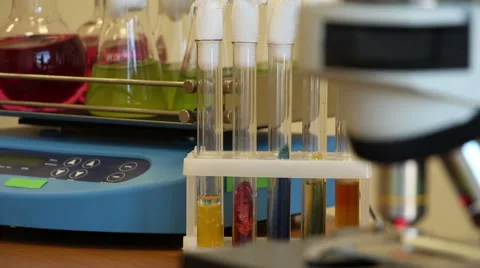 Microscope on the moving laboratory background panning close up Stock-Footage 63045769