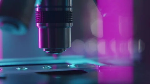 Microscope Objective Lens Slowly Moving above Glass Slide in Lab Stock Footage 315131106