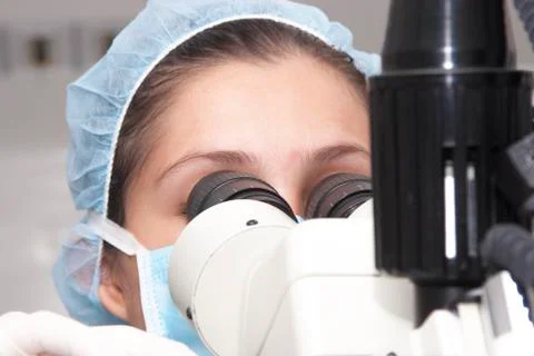 At the microscope Stock Photos