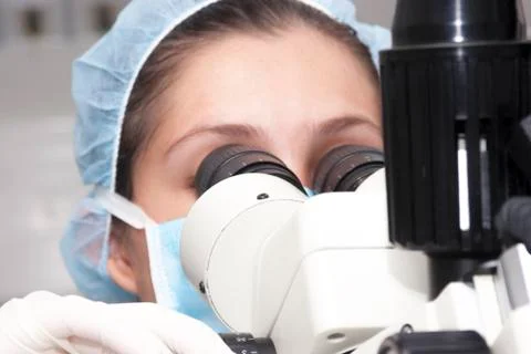 At the microscope Stock Photos