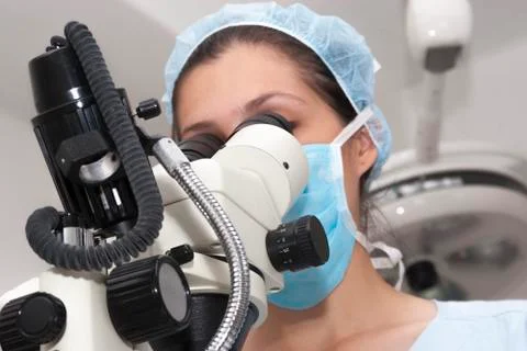 At the microscope Stock Photos