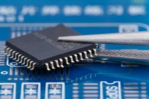 Microscope probe gently touches a microchip Stock Photos