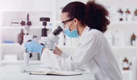 Microscope, sample analysis and woman scientist in a lab for science, covid and Photos