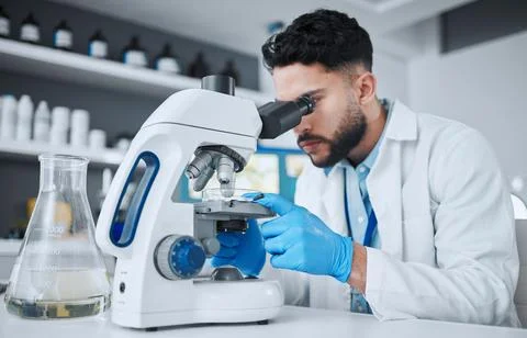 Microscope, science and research with man in laboratory for pharmacy, medical Stock Photos