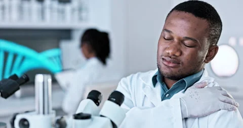 Microscope, science and shoulder pain wi... | Stock Video | Pond5