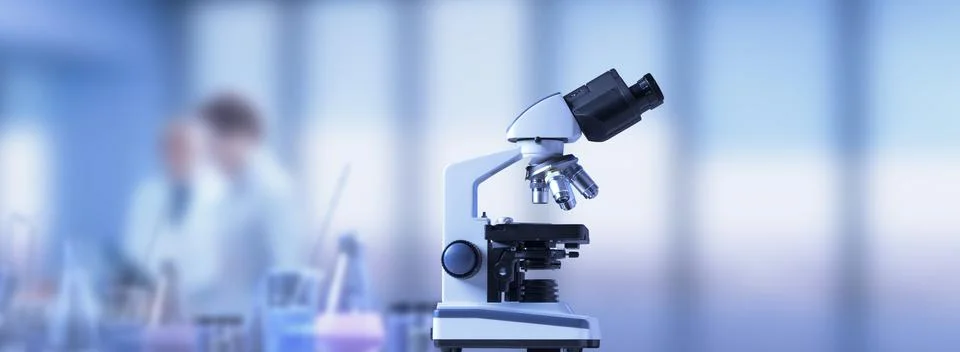 Microscope in the science lab Stock Photos