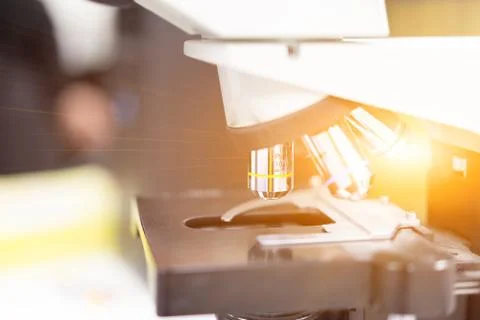 Microscope is shining special thing in science lab. Stock Photos