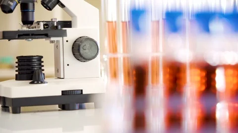 The microscope on the side of the test kits for COVID-19 coronavirus Stock Footage 127944327