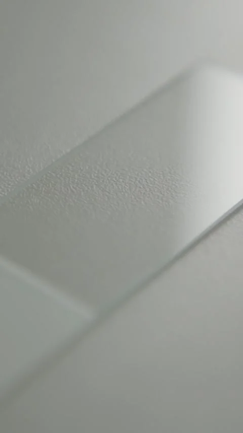 Microscope Slide Close-Up in Lab Setting with Soft Lighting Stock Footage 318579863