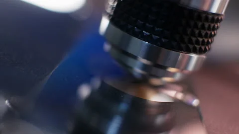 Microscope. A slide with a liquid sample. Biological and chemical pollution  Stock Footage 143759685