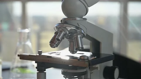 Microscope stands in laboratory with large windows Stock Footage 143560015