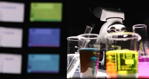 Microscope stands on table in chemistry lab closeup Stock Photos