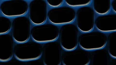 Microscope view of metallic shaving foil with micro-perforations. Advanced Stock Footage 317554666