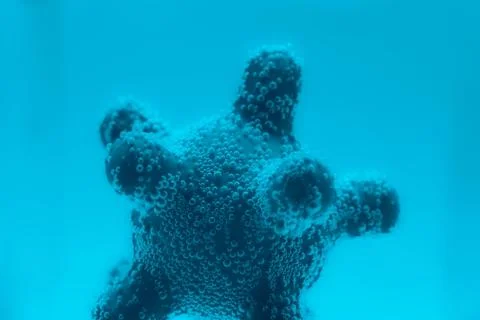 Microscope virus model in test tube close up Stock Photos