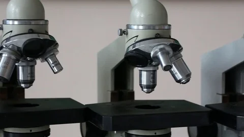 Microscopes in the row dolly shot in laboratory close up Stock Footage 72822335