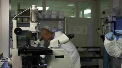 Microscopes Woman in Front Stock Footage 22783539