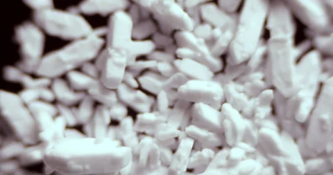 Microscopic 100x view of Sodium Carbonate (Na2CO3) crystals showing monoclinic Stock Footage 303634971
