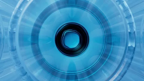 A microscopic display of blue, technologically-charged test tube liquid Video stock 324695825