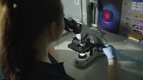 Microscopic Insights: Doctor's Close-up Examination Stock Footage 242167556