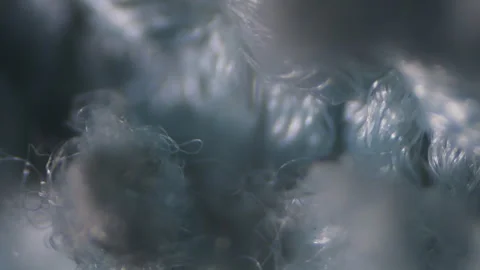 Microscopic view of microfiber cloth texture with dynamic rack focus Stock Footage 344844611