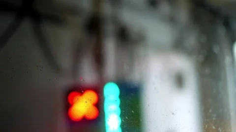 Microscopic water droplets sliding down the windshield of a car in car wash Stock Footage 79633649