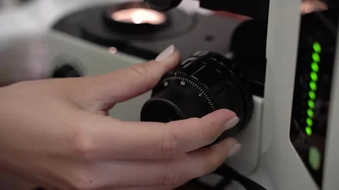 Microscopy in Action Analyzing Various Samples Under a HighPower Microscope for Stock Footage 300489350