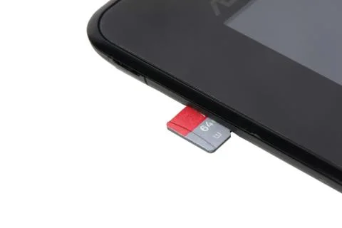 Microsd memory card and tablet slot Stock Photos
