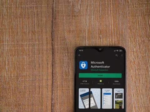 Microsoft Authenticator app play store page on the display of a black mobile  Stock Photos