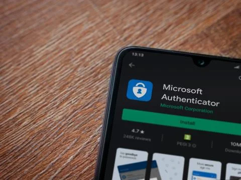 Microsoft Authenticator app play store page on the display of a black mobile  Stock Photos