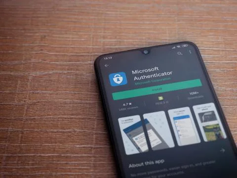 Microsoft Authenticator app play store page on the display of a black mobile  Stock Photos