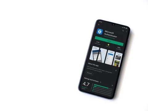 Microsoft Authenticator app play store page on the display of a black mobile  Stock Photos