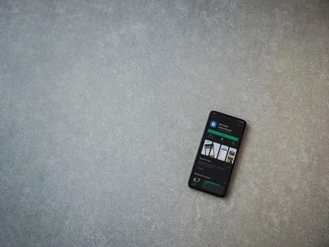 Microsoft Authenticator app play store page on the display of a black mobile  Stock Photos