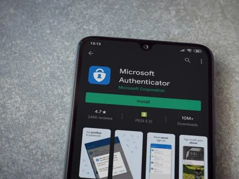 Microsoft Authenticator app play store page on the display of a black mobile  Stock Photos