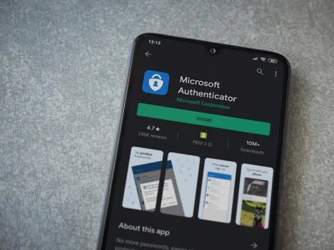 Microsoft Authenticator app play store page on the display of a black mobile  Stock Photos