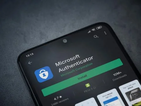 Microsoft Authenticator app play store page on the display of a black mobile  Stock Photos