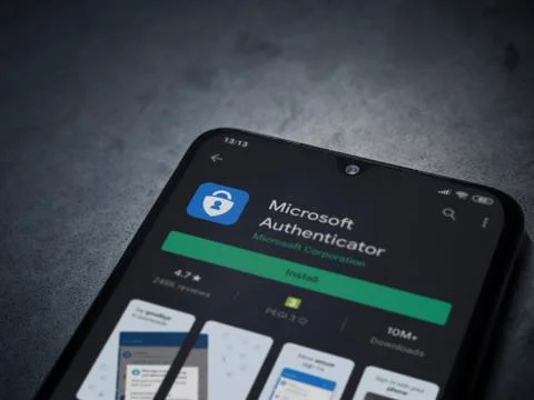 Microsoft Authenticator app play store page on the display of a black mobile  Stock Photos