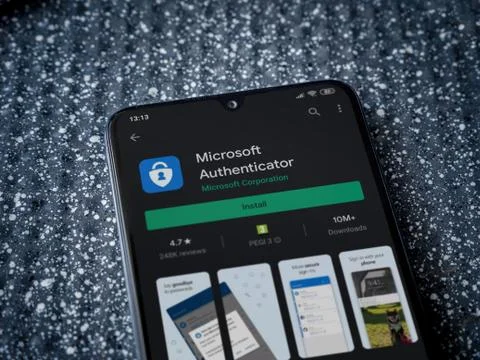 Microsoft Authenticator app play store page on the display of a black mobile  Stock Photos