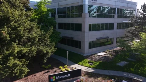 Microsoft campus office building with glass curtain wall facade and branded Video stock 336694992