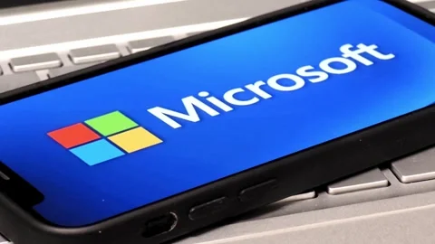 Microsoft Corporation logo displayed on mobile phone Stock Footage 324705758