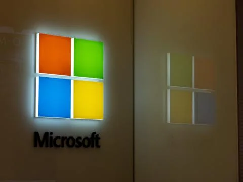 Microsoft logo and reflection outside of Microsoft Store location Stock Photos